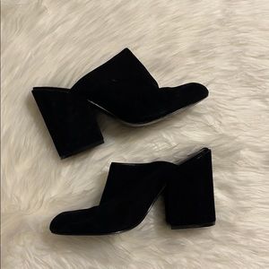 Black Steve Madden Suede Closed Toe Mules.